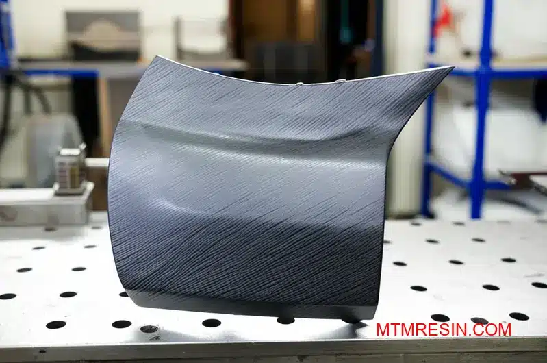 Premium polypropylene compound automotive panel showcasing glass-reinforced engineering plastic material properties and surface quality