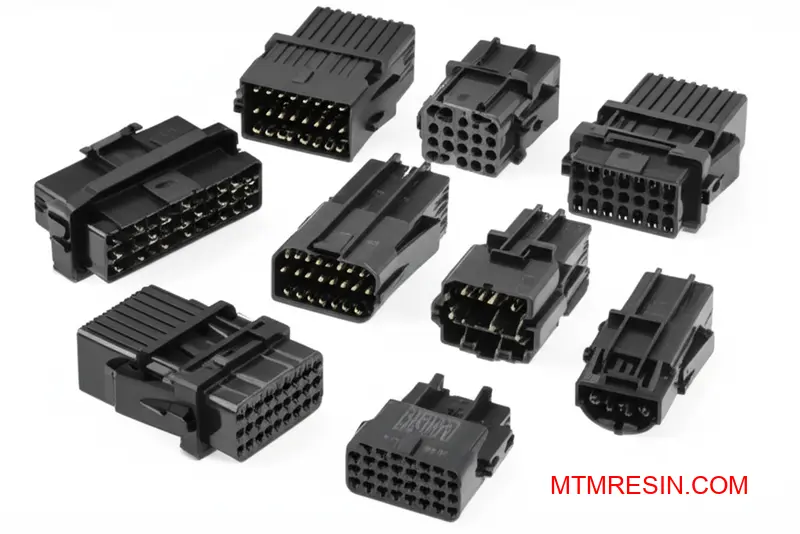 Precision-engineered automotive electrical connectors manufactured from high-performance polybutylene terephthalate material with enhanced dimensional stability